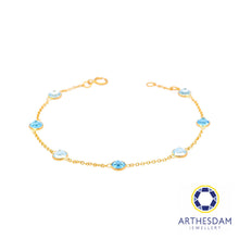 Load image into Gallery viewer, Arthesdam Jewellery 18K Yellow Gold Heather Bracelet (Dark Blue Topaz)
